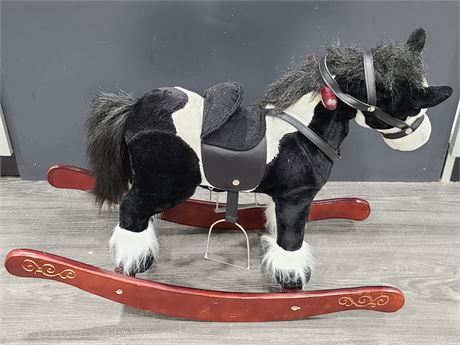 ROCKING HORSE W/ ELECTRONIC SOUNDS & MOVEMENT (Head and tail) 32"X21"