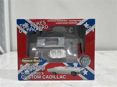 NEW IN BOX 2002 AMERICAN MUSCLE BODY SHOP BOSS HOGGS CADILLAC