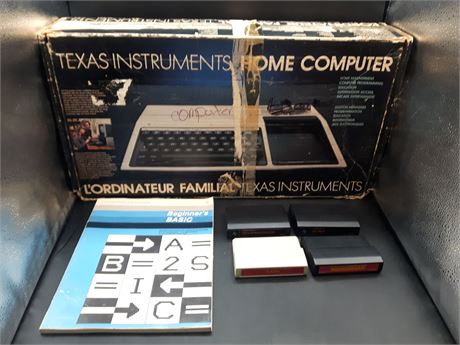 TEXAS INSTRAMENTS CONSOLE IN BOX WITH GAMES - UNTESTED - AS IS