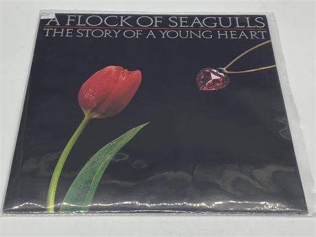A FLOCK OF SEAGULLS - THE STORY OF A YOUNG HEART - NEAR MINT (NM)