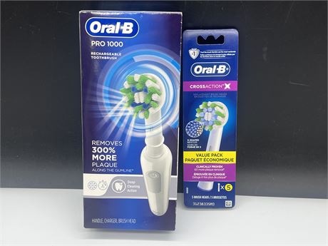 (NEW) ORAL B PRO 1000 TOOTHBRUSH W/BRUSH HEADS
