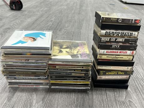 LOT OF CDS & CASSETTES - HAS SMOKE SCENT