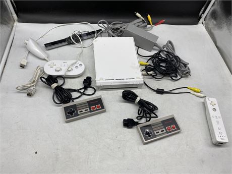 LOT OF NINTENDO PRODUCTS INCLUDING, 2 NES CONTROLLERS, & COMPLETE WII WITH