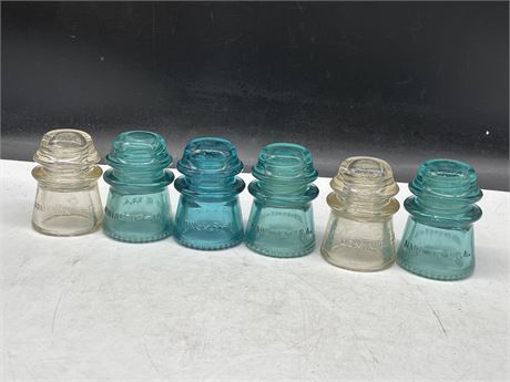 6 GLASS INSULATORS - (4 BLUE & 2 CLEAR)