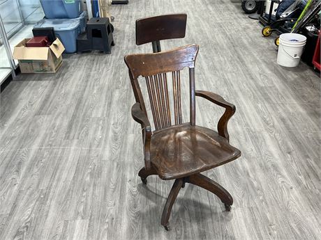 ANTIQUE WOOD ROLLING CHAIR (46” tall)