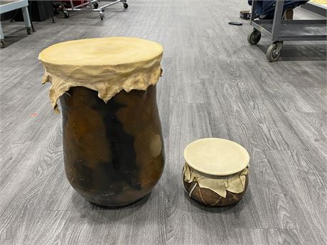 2 VINTAGE CLAY/WOODEN HIDE SKIN DRUMS - LARGER ONE IS 17.5” X 12”