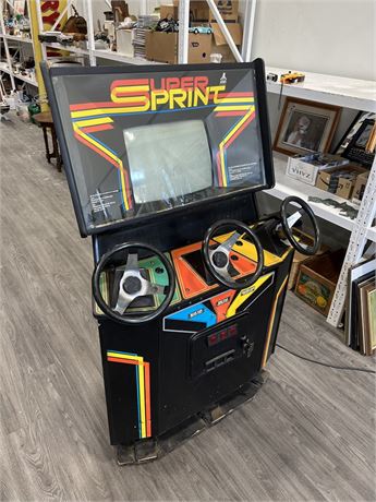 1986 SUPER SPRINT ATARI ARCADE GAME W/MANUAL - POWERS ON BUT NEEDS WORK(64” tall