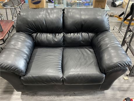 LEATHER COUCH (64” long)