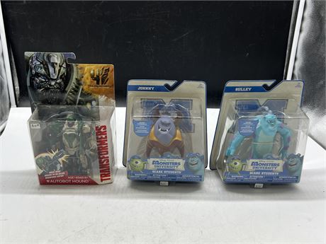 2 MONSTERS INC FIGURES & 1 TRANSFORMERS FIGURE IN PACKAGES