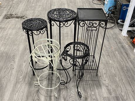 5 VINTAGE WROUGHT IRON PLANT STANDS (LARGEST IS 10”X27.5”)
