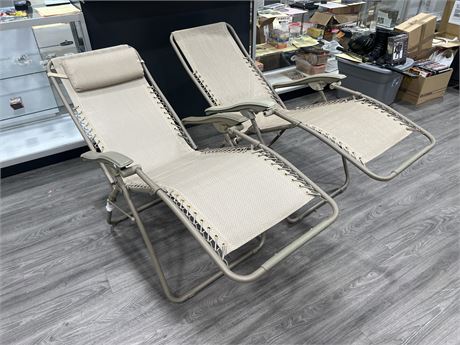 2 FULL SIZE FOLDING LOUNGE CHAIRS - 1 IS NEW