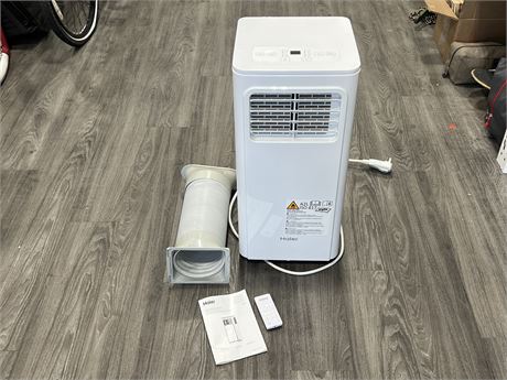HAIER PORTABLE AIR CONDITIONER W/REMOTE - WORKS (1 year old)