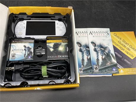 PSP ASSASSINS CREED WITH BOX & GAMES
