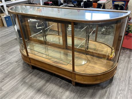 ANTIQUE CURVED GLASS DISPLAY CASE W/SHELVES & ORIGINAL LIGHTS (72”wide, 40”tall)