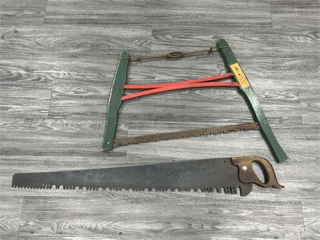 2 VINTAGE WOODEN SAWS - LARGER ONE IS 46” LONG