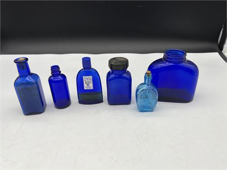 6 VINTAGE / ANTIQUE BLUE GLASS BOTTLES - LARGEST IS 5”