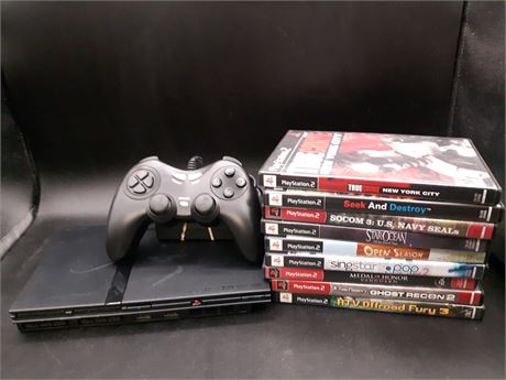 PS2 SLIM CONSOLE WITH GAMES (CONSOLE LASER A BIT PICKY - MAY NEED CLEANING)