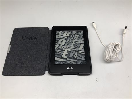 KINDLE E READER WITH NEW CORD (WORKS)