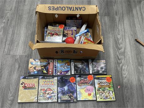 BOX OF ASSORTED EMPTY VIDEO GAME CASES MOST W/ MANUALS - NO SHIPPING