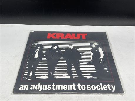 1988 PRESS - KRAUT - RED VINYL - AN ADJUSTMENT TO SOCIETY - EXCELLENT (E)