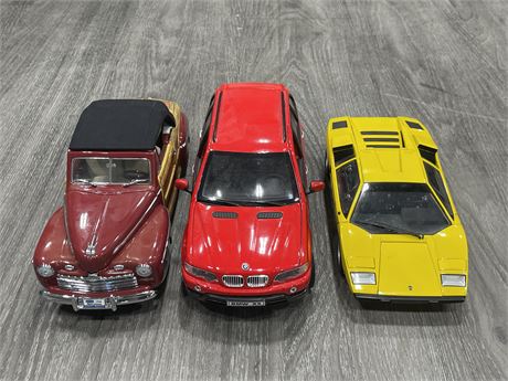 (3) 1:18 SCALE DIECAST CARS - UNSURE IF ALL ARE COMPLETE