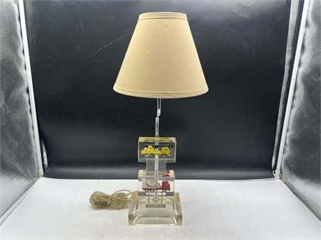 VINTAGE TOY TRUCKS IN LUCITE BASE TABLE LAMP - 20” TALL