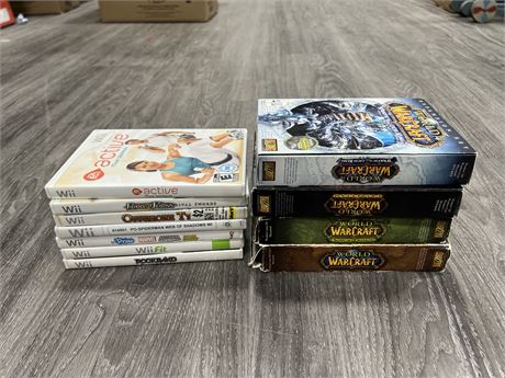 4 WORLD OF WARCRAFT PCS GAMES & 7 WII GAMES
