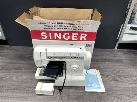 IN BOX SINGER 2502 SEWING MACHINE - TESTED