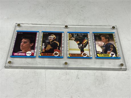4 CANUCKS ROOKIE CARDS IN CASE