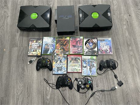 MISC VIDEO GAME LOT - 2 XBOX’S & 1 PS2 + MISC. GAMES AND CONTROLLERS - AS IS