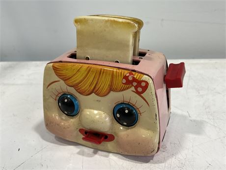 VINTAGE MADE IN JAPAN TOY TOASTER - EYE & TONQUE MOVE (7” wide)