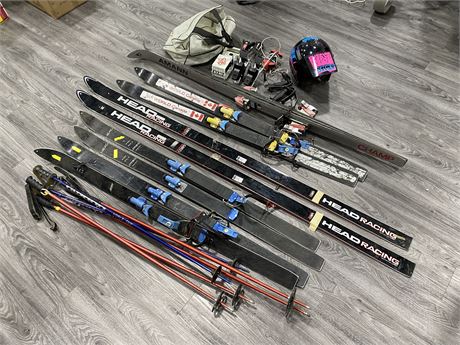 5 PAIRS OF SKIS & 3 SETS OF SKI POLES INCLUDING ACCESSORIES