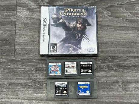 6 NINTENDO DS GAMES - 1 SEALED—PIRATES OF THE CARIBBEAN