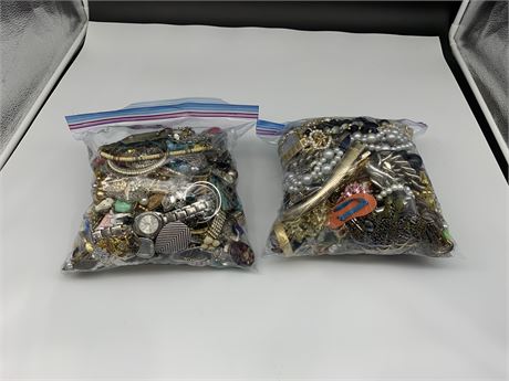 2 LARGE BAGS OF MISC JEWELRY + WATCHES
