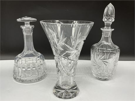 PINWHEEL CRYSTAL DECANTER & VASE PLUS ANOTHER CRYSTAL DECANTER (8.5” TALL)