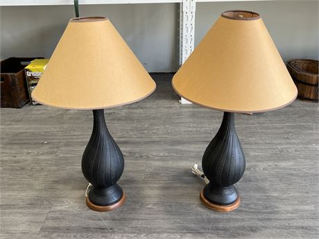 2 MID-CENTURY BLACK LAMPS (32” tall)
