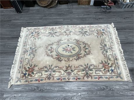 80”x48” VINTAGE HAND KNOTTED CARPET