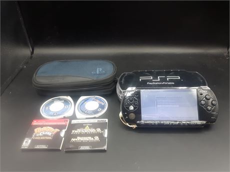 PSP CONSOLE WITH GAMES