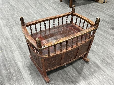 ANTIQUE CHINESE BABY CRADLE (37” long, 30” tall)