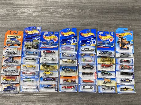 43 PACKAGED DIE CAST CARS - MOSTLY HOT WHEELS, SOME MATCHBOX — 1997, 1999, 2011