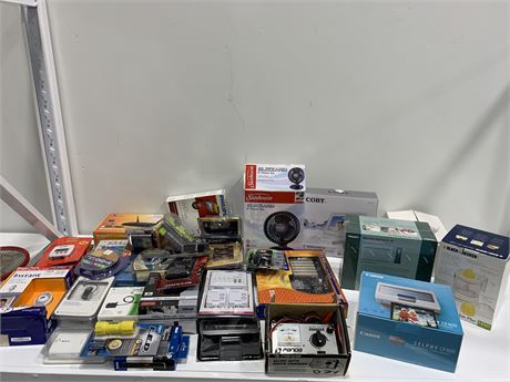 SHELF LOT OF MOSTLY NEW ELECTRONICS AND HOUSEHOLD ITEMS