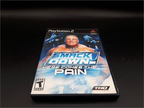 WWE SMACKDOWN HERE COMES THE PAIN - CIB - VERY GOOD CONDITION - PS2