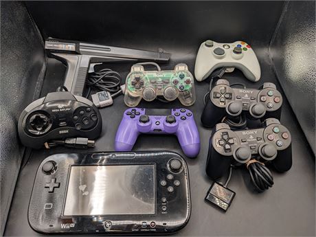 COLLECTION OF CONTROLLERS / GAMEPADS NEEDING VARIOUS REPAIRS - AS IS