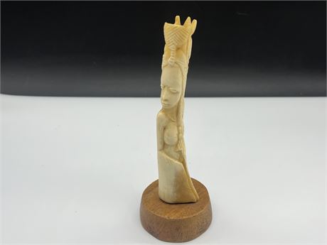 BONE CARVING ON STAND (9” tall)