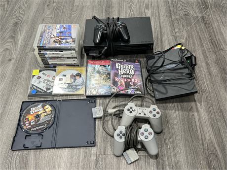 VIDEO GAME LOT - 2 PS2 CONSOLES W/ CONTROLLERS, GAMES & ECT