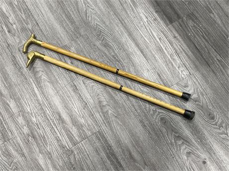 2 BRASS HANDLED CANES WITH REMOVABLE TOPS