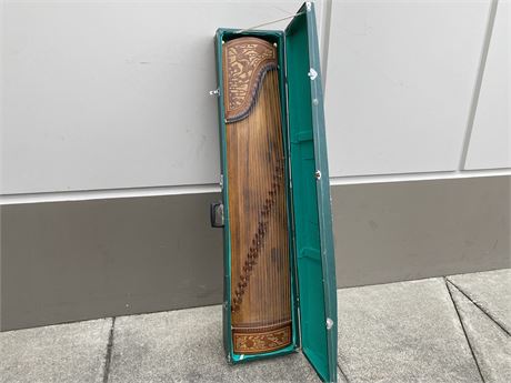 VINTAGE ZHANG CHINESE CARVED INSTRUMENT W/CASE (66” long)