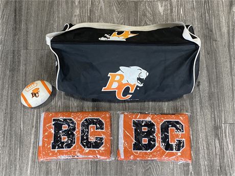 BC LIONS DUFFLE BAG, 2 NEW SCARVES, + SIGNED FOOTBALL