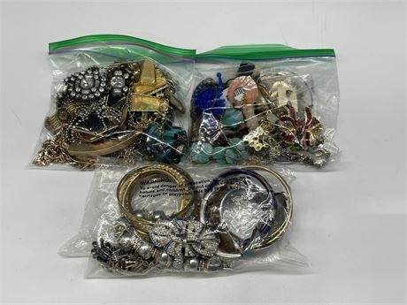 3 GRAB BAGS OF COSTUME JEWELRY - ONE BAG HAS CLOISONNÉ BENGALS