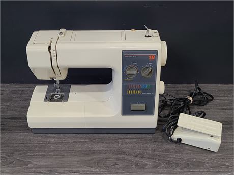 KENMORE 18 STITCH SEWING MACHINE (tested working)